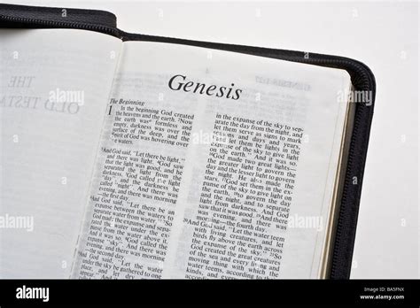 Christian Bible Open At The First Page Of The Book Of Genesis Stock