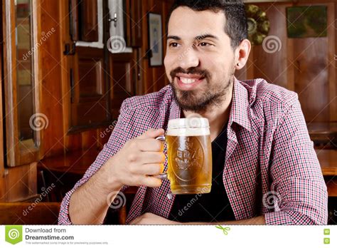Latin Man Drinking Beer At A Bar Stock Photo Image Of Lifestyle