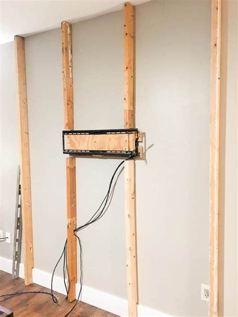 Measure from the bottom of the tv to the bottom of the wall mount so your tv will hang at the desired level. Wood Plank TV Wall | Pallet accent wall, Diy tv wall mount ...