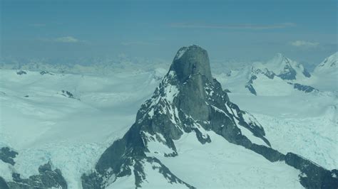 A photo of devil's thumb pass and the devil's thumb (on the horizon, right of center) and devil's thumb ranch (foreground), a resort that caters to cross country skiers, with about 150 km of. Devil's Thumb, Alaska | John Krakauer wrote about this ...