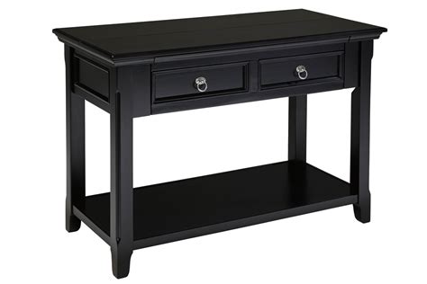 Using your longer wood screws, attach the desk to the furring strip you just attached to the wall. Black Sofa Table with Drop Down Desk at Gardner-White