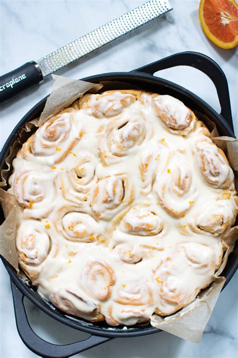This soft, fluffy cinnamon roll recipe with the perfect blend of cinnamon and sugar, is topped with the most luscious cream cheese frosting. Fluffy Homemade Orange Cinnamon Rolls | Recipe (With ...