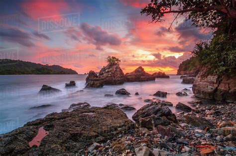 Rocky Coastline At Sunset Pegadung Beach Lampung Indonesia Stock