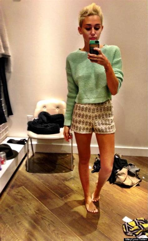 miley cyrus selfie starlet consults with 11 million twitter followers about a sweater photo