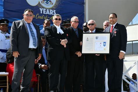 cayman islands national heroes day celebrates coat of arms pioneers ieyenews