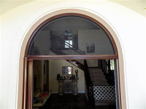 Arched Single Door Stowaway Retractable Screen With Mahogany Housing