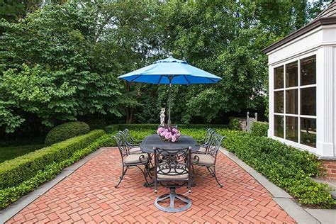 There are many different patio paver ideas that you can choose from including flagstone, concrete, wood, and brick. Winnetka Red Brick Paver Patio and Outdoor Room - Van Zelst