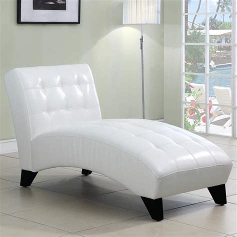 A white and bright chaise lounge chair with a clean aesthetic and plush pillows. Axis White Faux Leather Chaise Lounge Chair - Free Shipping Today - Overstock.com - 13310229