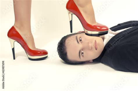 Woman In Control Of A Man Sexy Woman Foot On A Man Face Stock