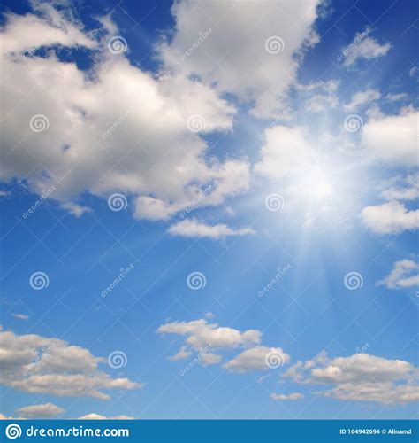 Blue Sky Bright Midday Sun Illuminates The Space Stock Photo Image