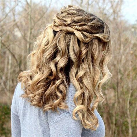 love this half up half down curly hairstyle with twists the blonde hair makes it so pretty