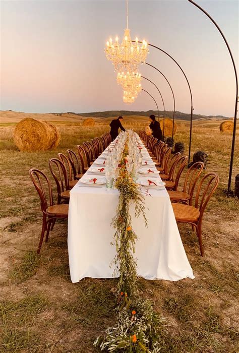 Stunning Sunset Tuscany Wedding Reception With Rustics Flowers And