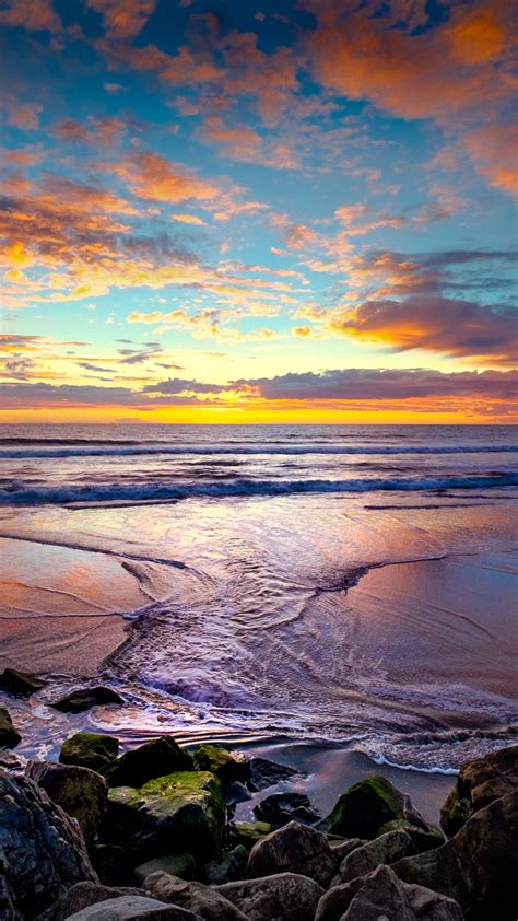 Download Sea waves, coast, sunset, beautiful wallpaper, 1440x2560, QHD ...