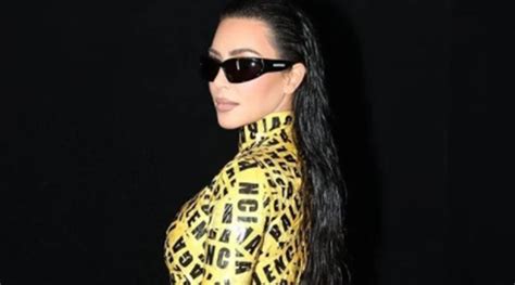 paris fashion week kim kardashian wears yellow caution tapes for balenciaga show demna