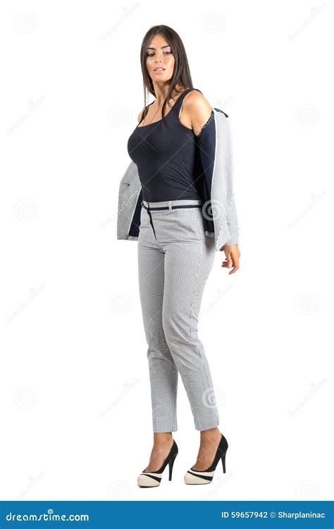Young Business Woman In Formal Wear Taking Off Jacket Stock Photo