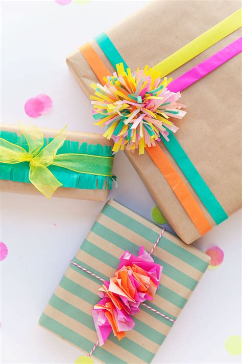 A simple and versatile unique gift wrapping idea is to use brown paper as the base layer. 3 FUN WAYS TO WRAP WITH TISSUE PAPER - Tell Love and Party