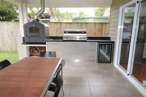 Browse modern outdoor decorating ideas and remodel inspiration, including unique landscapes, pools, porches, and patios to create your inspiration for a large modern backyard tile patio kitchen remodel in miami with a roof extension ceiling with fans? Outdoor Kitchen - Redcliffe - Modern - Exterior - Brisbane ...