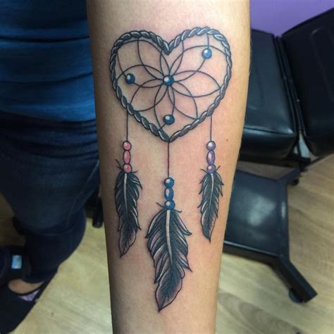 Https://tommynaija.com/tattoo/dream Catcher Tattoo Design With Heart