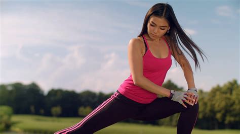 Asian Woman Stretching Legs Outdoor Fitness Woman Doing Stretching