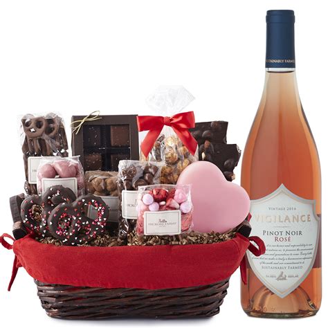 There is a fine line to walk between giving a gift that does not match the level of affection in the relationship and getting it just right. Valentine's Day Sweets & Rosé Gift Basket | Hickory Farms