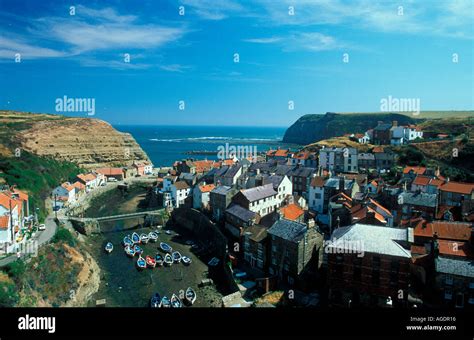Aerial View Of Staithes North Yorkshire England Showing Harbour At