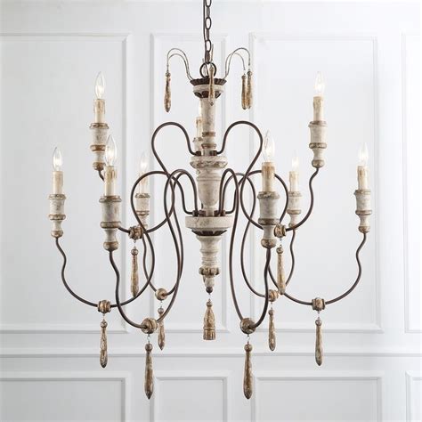 A Chandelier With Candles Hanging From It