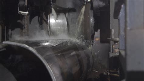 Tube Rolling Process At Manufacturing Plant Closeup Of Production