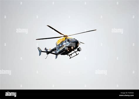 A Metropolitan Police Helicopter Flies Over London To Observe Crowd