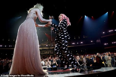 Elle Fanning Dazzles In Daring Blush And Silver Hued Gown At Iheartradio Awards 2019 Daily