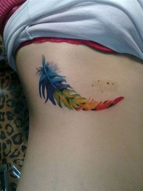 Lovely Colorful Feather Tattoo On Rib Side Feather Tattoo Colour Rib