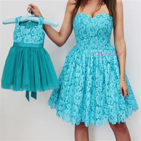 Spending a leisure time with the little ones in mom & me family matching clothing would be a sweet experience getting along with each other. Black pink dress Matching Dresses Mother Daughter black ...
