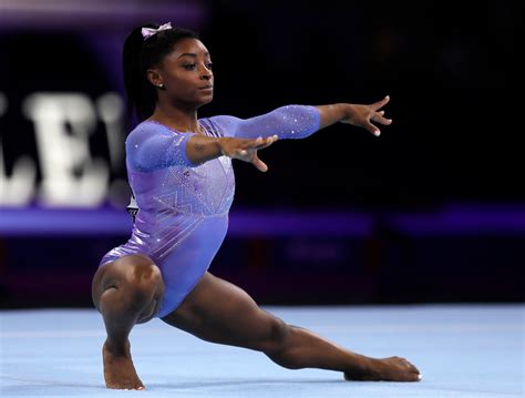 gymnast simone biles breaks record for all time most medals won at world championships sbs news