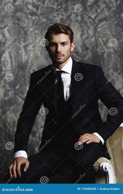 Handsome Men In Suit Gesturing With Drawn Charts Royalty Free Stock