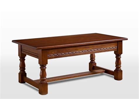 The top surface of the table is adjustable with a hand crank on the bottom, making it easy to personalize. Old Charm Coffee Table - Wood Bros
