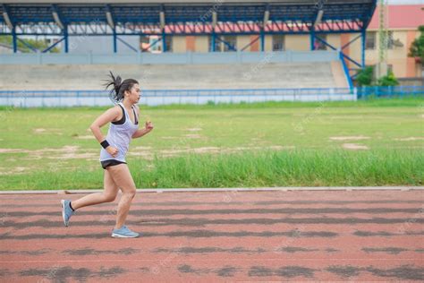 Premium Photo Asian Beautiful Woman Running On The Trackthailand Peoplethe Runners Run