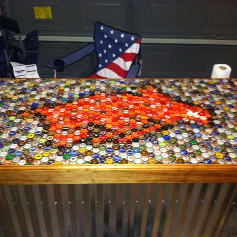 Its a super fun conversation starter that comes out on special occasions. bar top made out of beer bottle caps! Razorback pride ...