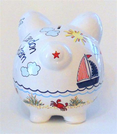 The piggy bank is known to collectors as a still bank as opposed to the mechanical banks popular in the early 20th century. Personalized Piggy Bank with Navy Blue and Red Sailboats ...