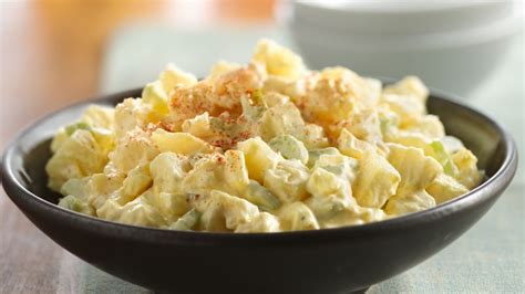 Easy creamy potato salad recipe with lots of tips for making it best, including the best potatoes to we simmer potatoes whole in salted water when making potato salad. Creamy Potato Salad recipe from Betty Crocker