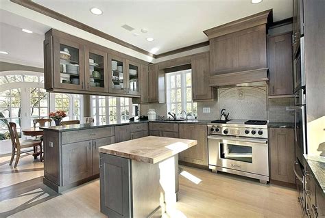 Gray stained kitchen cabinets are the mediators of kitchen design styles. Cabinets-close to Maple with flint stain? | Stained ...