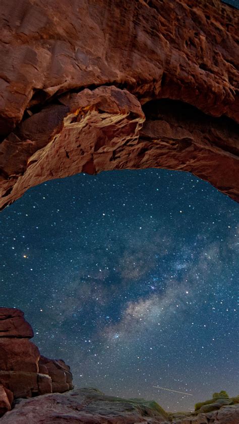 Download Wallpaper 720x1280 Cave Night Arch Rocks Nature Samsung