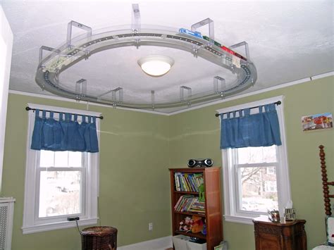 Suspend the track to make it level. For families with kids | Train bedroom, Train room, Model ...