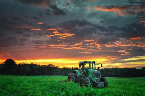 Tractor At Sunset Photograph By Rosette Doyle