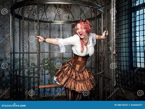 Screaming Beautiful Steampunk Woman In The Cage Stock Photo Image Of Masquerade Cage
