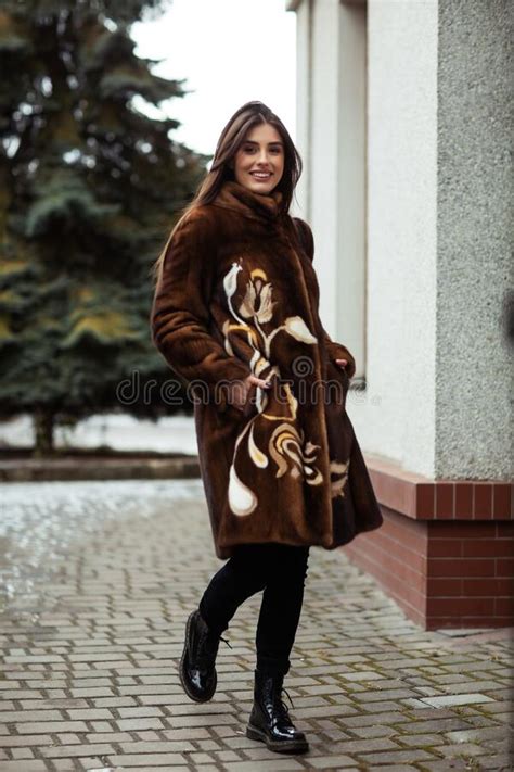 Glamorous Funny Young Woman With Smile Wearing Brown Fashionable Fur