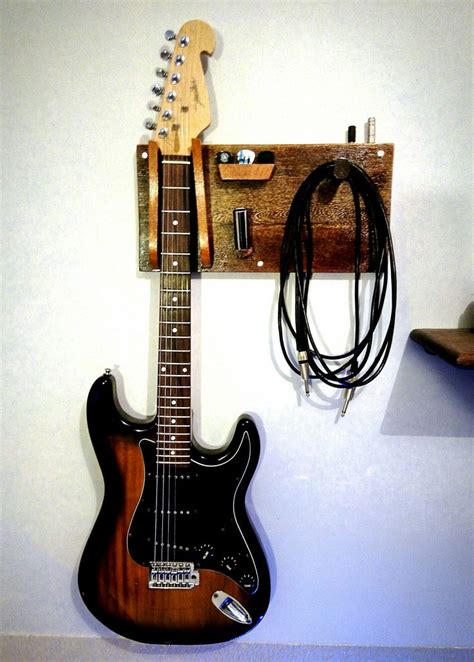 Then i hung all the hooks on the wall with drywall screws (either two or four screws each, depending on the weight of the guitar) right through the. Guitar / cable / pick / slide Holder Made with Wood | Guitar | Pinterest | Cable, Guitar and Woods