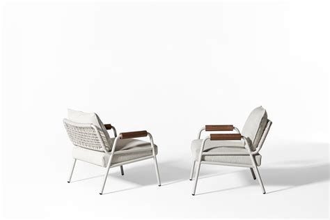 upholstered garden armchair with armrests zoe wood open air uno zoe wood open air collection by