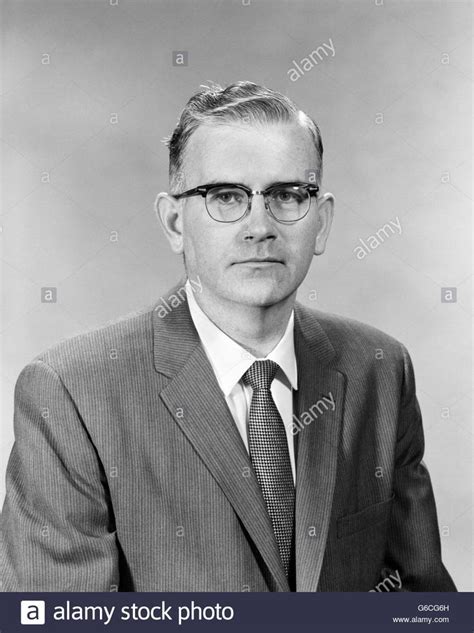 Download This Stock Image 1950s Portrait Man Wearing Glasses Suit Jacket Necktie Looking At