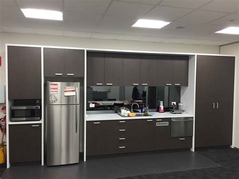 Our stock of cabinetry includes wall cabinets that hang above counters to store dishes, glasses, baking supplies, and more. Commercial Office Kitchen - Andrews Kitchens
