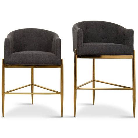 Sitting atop of a brass curved base and featuring a rounded seat cushion adding comfort and sty. Modern Style Full Back Tight Fit Bar Stool in Black ...