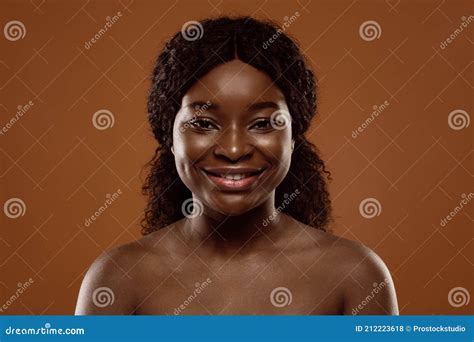 Portrait Of Attractive Naked African Woman With Beautiful Smile On